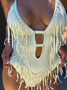 close up of fringe one piece in white